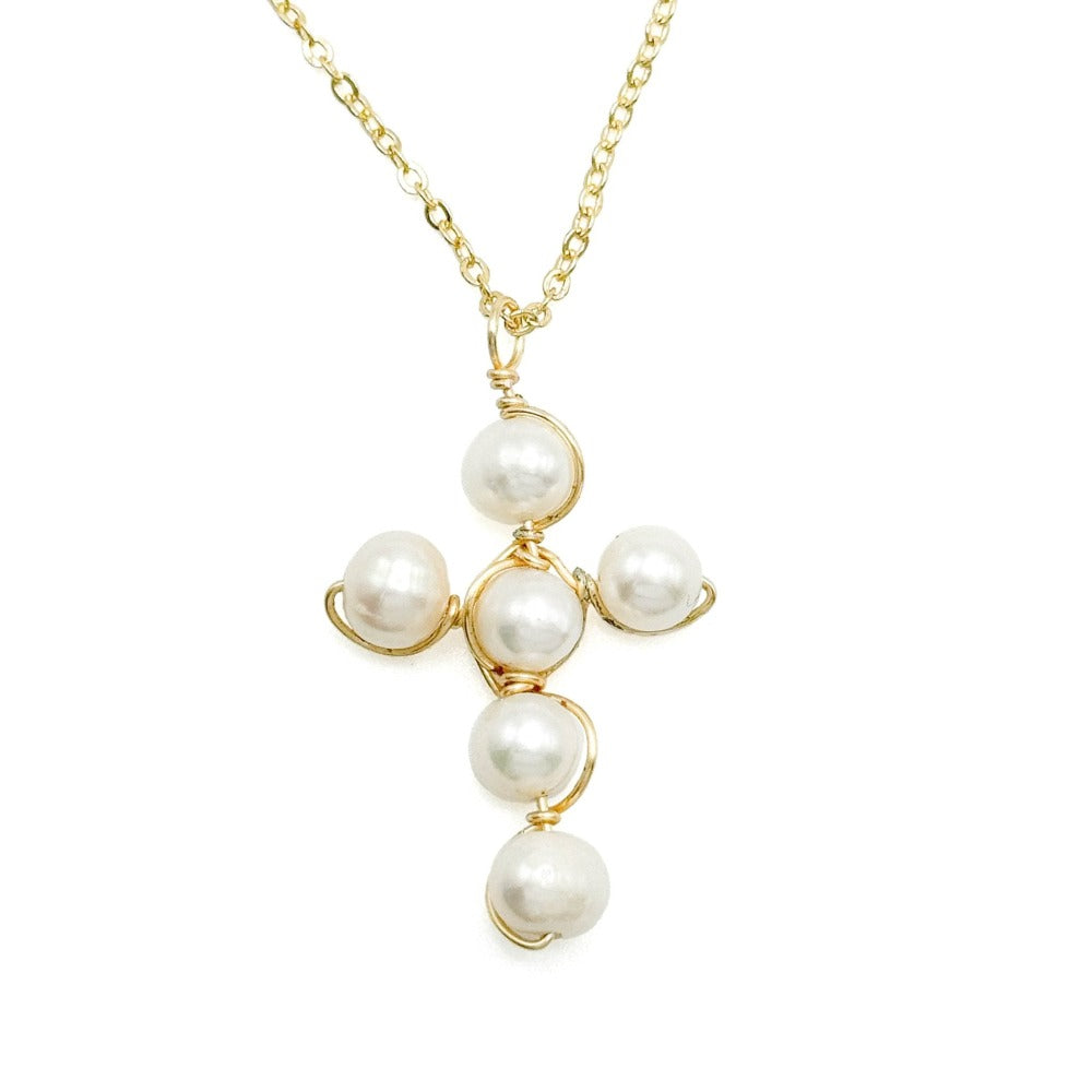 Pearl necklace with gold chain on a white background