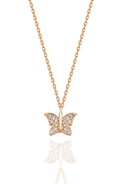Rose gold butterfly necklace with diamond accents on a white background